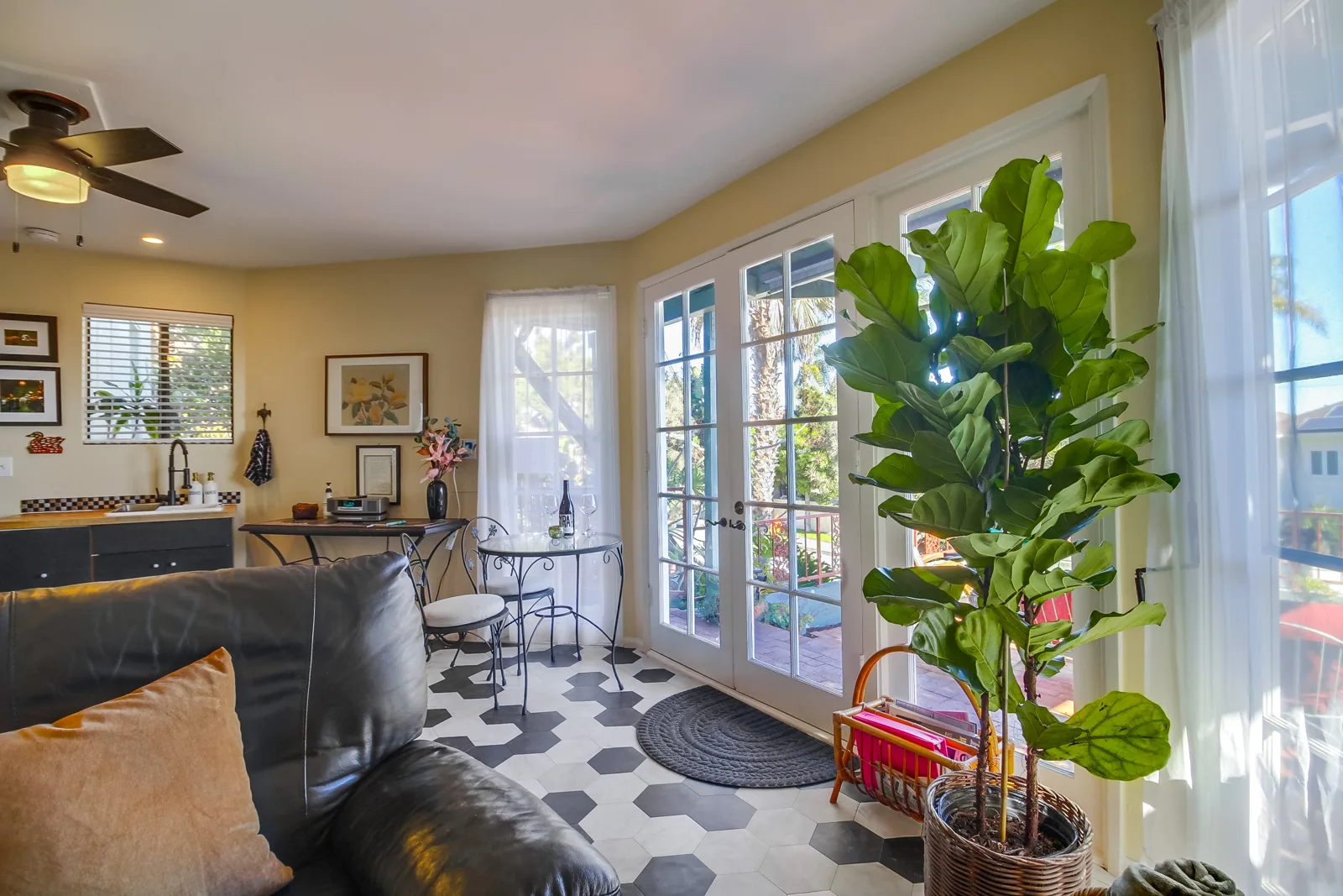 Enjoy the light streaming through the French doors.
